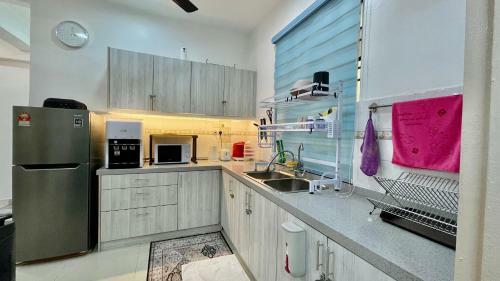 Apartamento Puteh Homestay