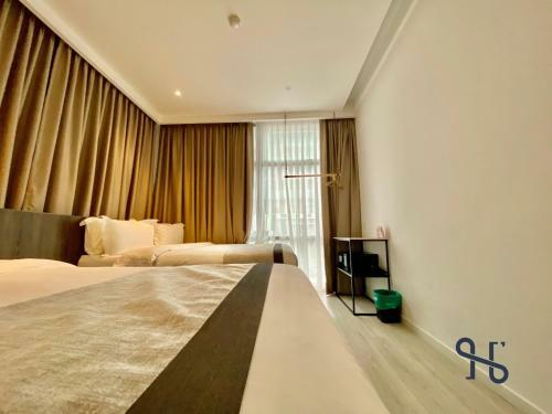 Hotel Jia By Homesuite' Near Imago Mall
