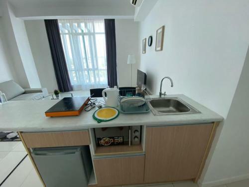 Apartamento Quality Homestay, Sutera Avenue Unit B