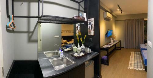 Apartamento Aeropod Rhy Homey Home Stay