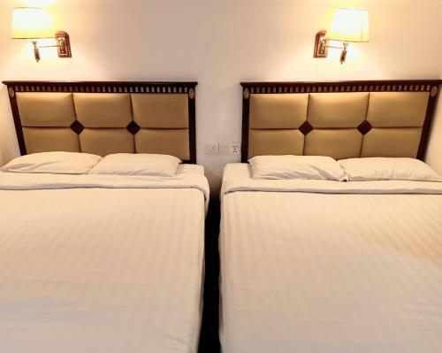 Oyo 90464 Borneo Suites Hotel
