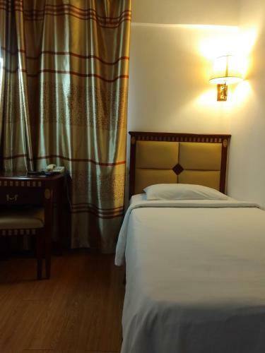 Oyo 90464 Borneo Suites Hotel