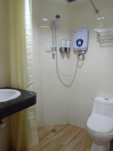 Oyo 90464 Borneo Suites Hotel