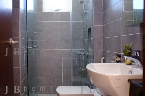 Apartamento Paragon Residences Straits View Homestay