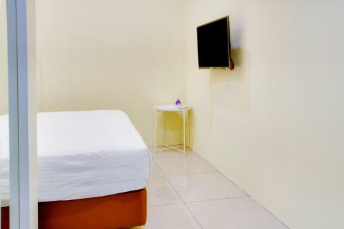 Hotel Oyo 90090 Roselyn Inn 2
