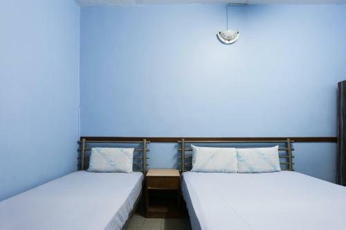 Spot On 89989 Wispering Hotel