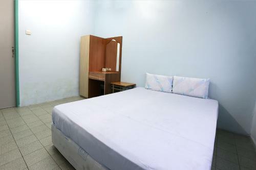 Spot On 89989 Wispering Hotel