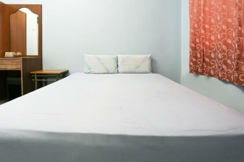 Spot On 89989 Wispering Hotel