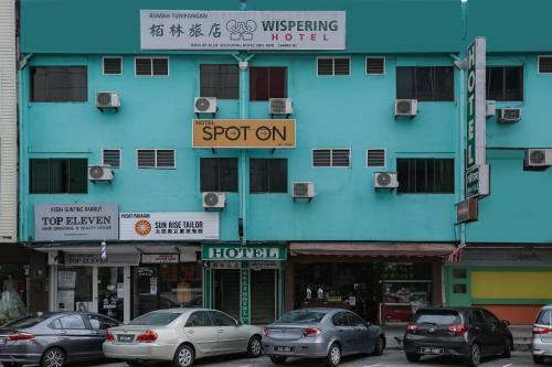 Spot On 89989 Wispering Hotel