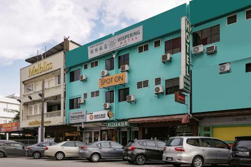 Spot On 89989 Wispering Hotel