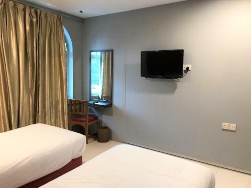 Oyo 90487 K Threegod Hotel