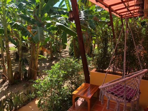 Hostal One World Bungalows