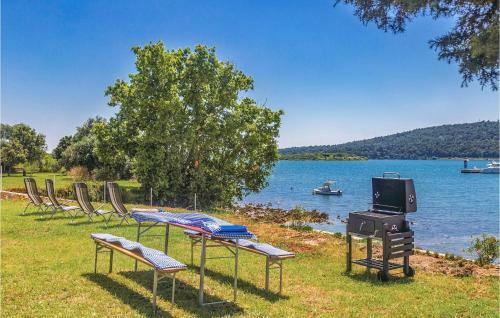 Amazing Apartment In Pomer With 1 Bedrooms