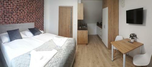 Apartm�nov� D?m Na Kolon�d?