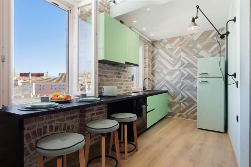 Apartamento Vailato Loft Suites