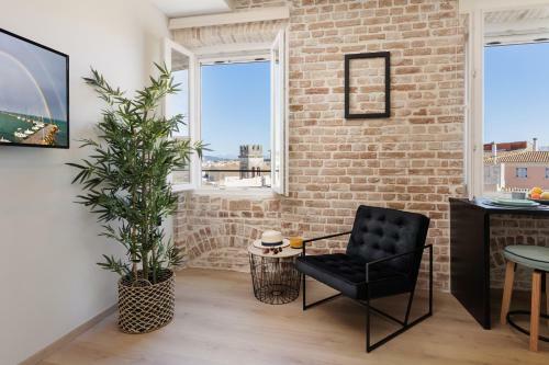 Apartamento Vailato Loft Suites