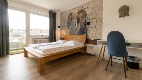 Giniushomes Apartment Am Bahnhof ,, Asian Elephant Room"