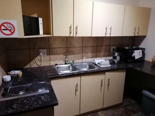 Apartamento Leopard Tree Guesthouse