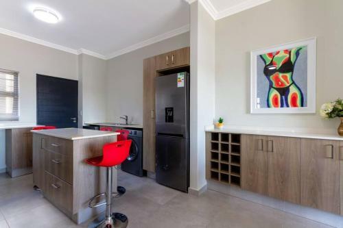 Apartamento Alimama Spaces: The Thando's Kyalami Woods