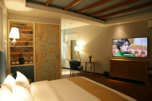 Hy Xman Hotel Qing Shan Branch