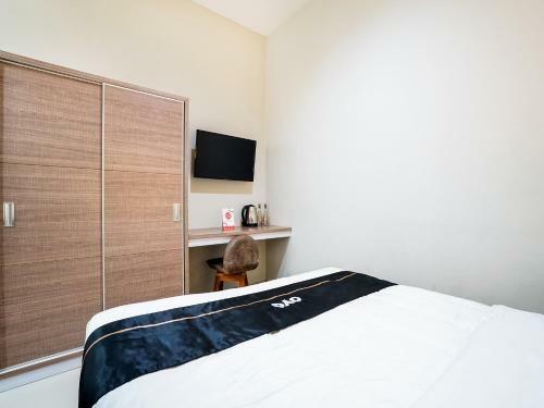 Hotel Oyo 90134 Santika Fidela