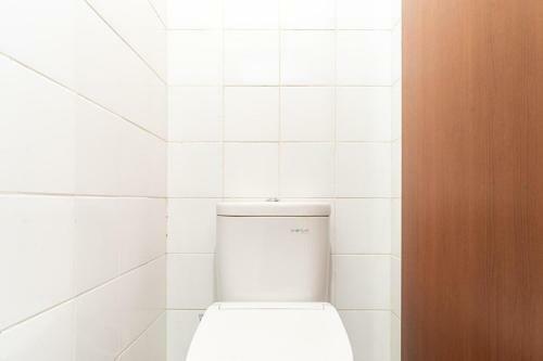 Hostal Reddoorz Plus @ Ecohome Citra Raya Tangerang