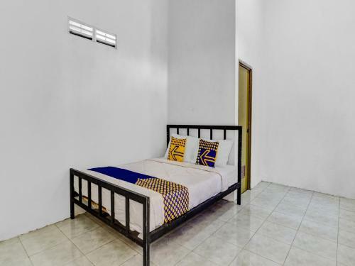 Hotel Spot On 90742 Kinanthy Homestay Syariah