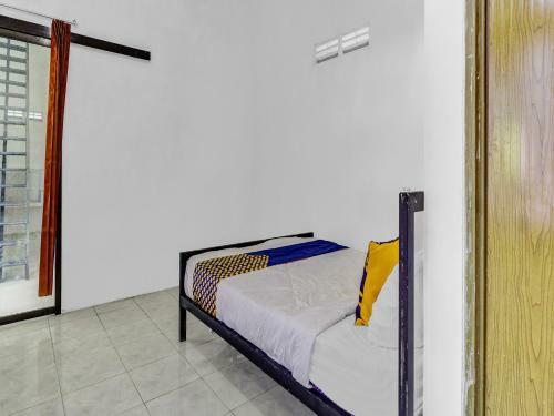 Hotel Spot On 90742 Kinanthy Homestay Syariah