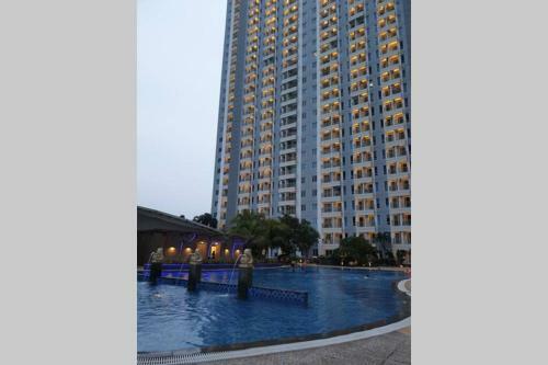 Cosmy Orchard Apartment At Pakuwon Mall With Wifi