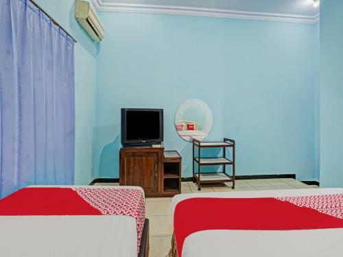 Hotel Oyo 90611 Griya Kutisari V Residence