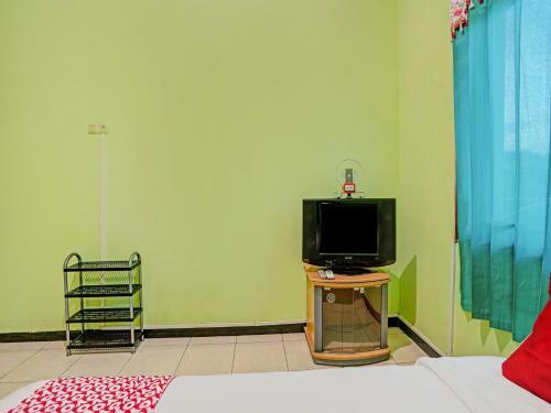 Hotel Oyo 90611 Griya Kutisari V Residence