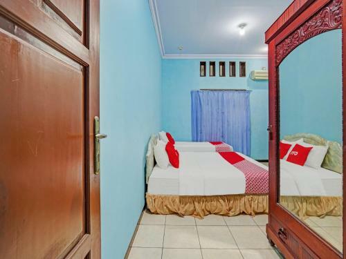 Hotel Oyo 90611 Griya Kutisari V Residence