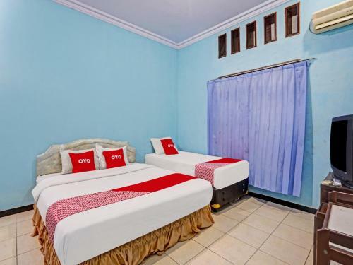 Hotel Oyo 90611 Griya Kutisari V Residence
