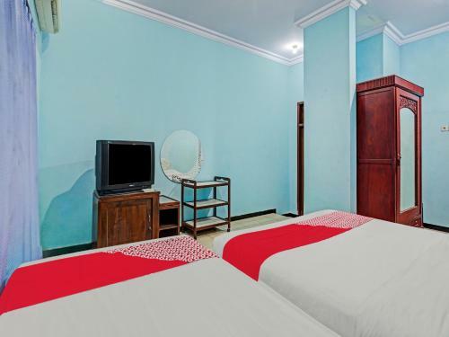 Hotel Oyo 90611 Griya Kutisari V Residence