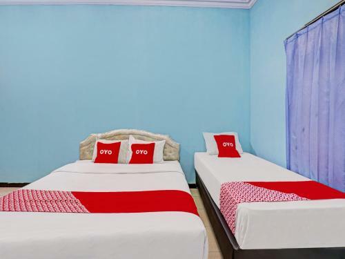 Hotel Oyo 90611 Griya Kutisari V Residence