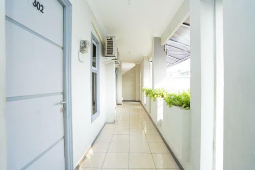 Hotel Vaccinated Staff - Oyo 2075 Graha Marina