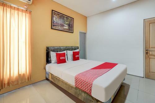 Hotel Oyo 90935 Rumah Kost Metroliving