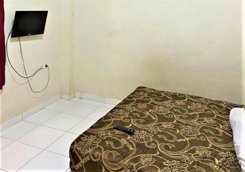 Hostal Penginapan Mangadel