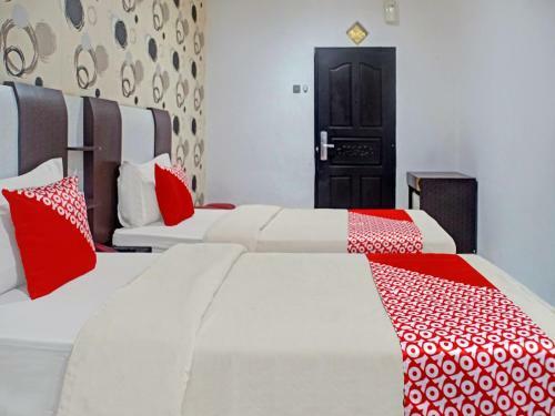 Oyo 90386 Hotel Mangga Dua Makassar