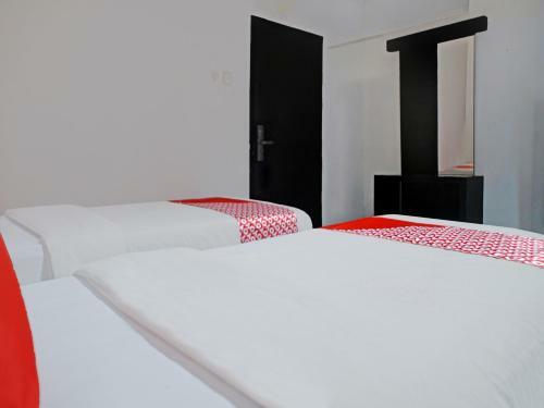 Oyo 90386 Hotel Mangga Dua Makassar