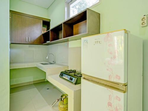 Hotel Oyo 90534 Amore Apartment