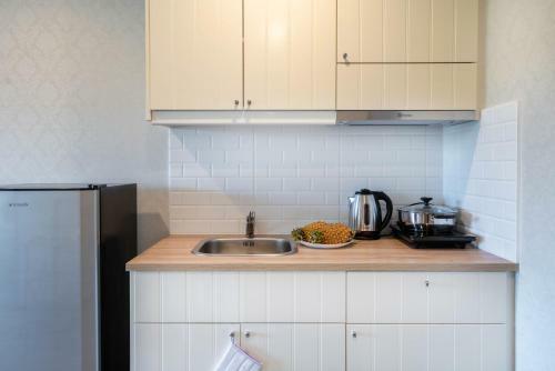Apartamento The Beachcomber @ Naiyang Beach