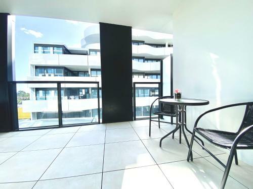 Apartamento Oakleigh Stylish 2b2b Apt With Beautiful View 4b