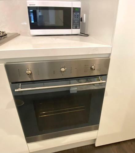 Apartamento Oakleigh Stylish 2b2b Apt With Beautiful View 4b