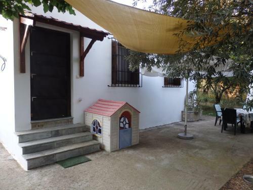 The Small House In The Olive Grove