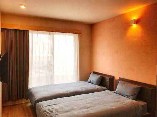 Hostal Room Biotop Yomitan