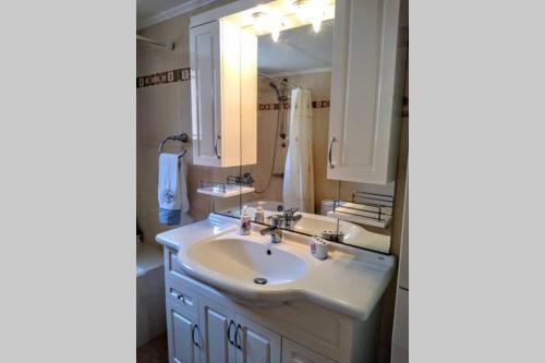 Embraced By Mountains, And Kissed By The Sea.