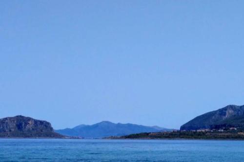 Embraced By Mountains, And Kissed By The Sea.