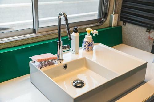 Londonbushotel & Wooddy