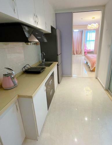 Aparthotel Pink Panther Theme Homestay